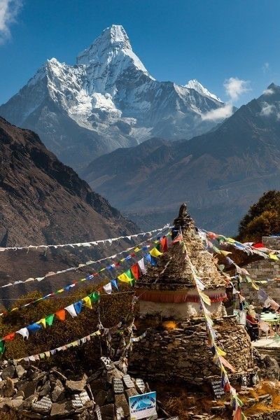 Everest Base Camp trek with prayer flags and Ama Dablam