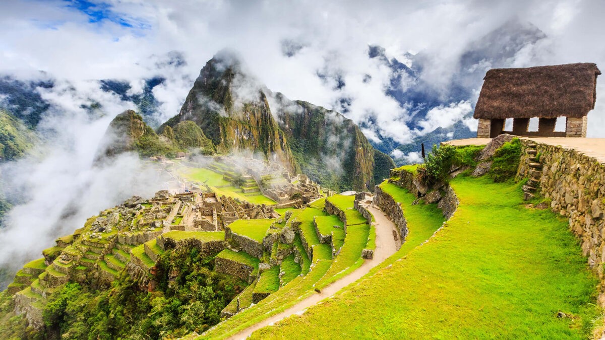 Machu Picchu with Huayna Picchu and morning clouds